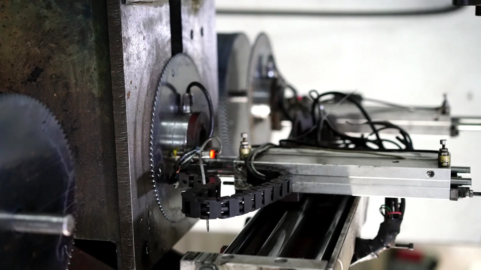 Saw blade processing machine in factory for production and inspection
